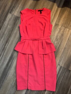BCBGmaxAzria Sleeveless Peplum Sheath Dress in Coral Pink